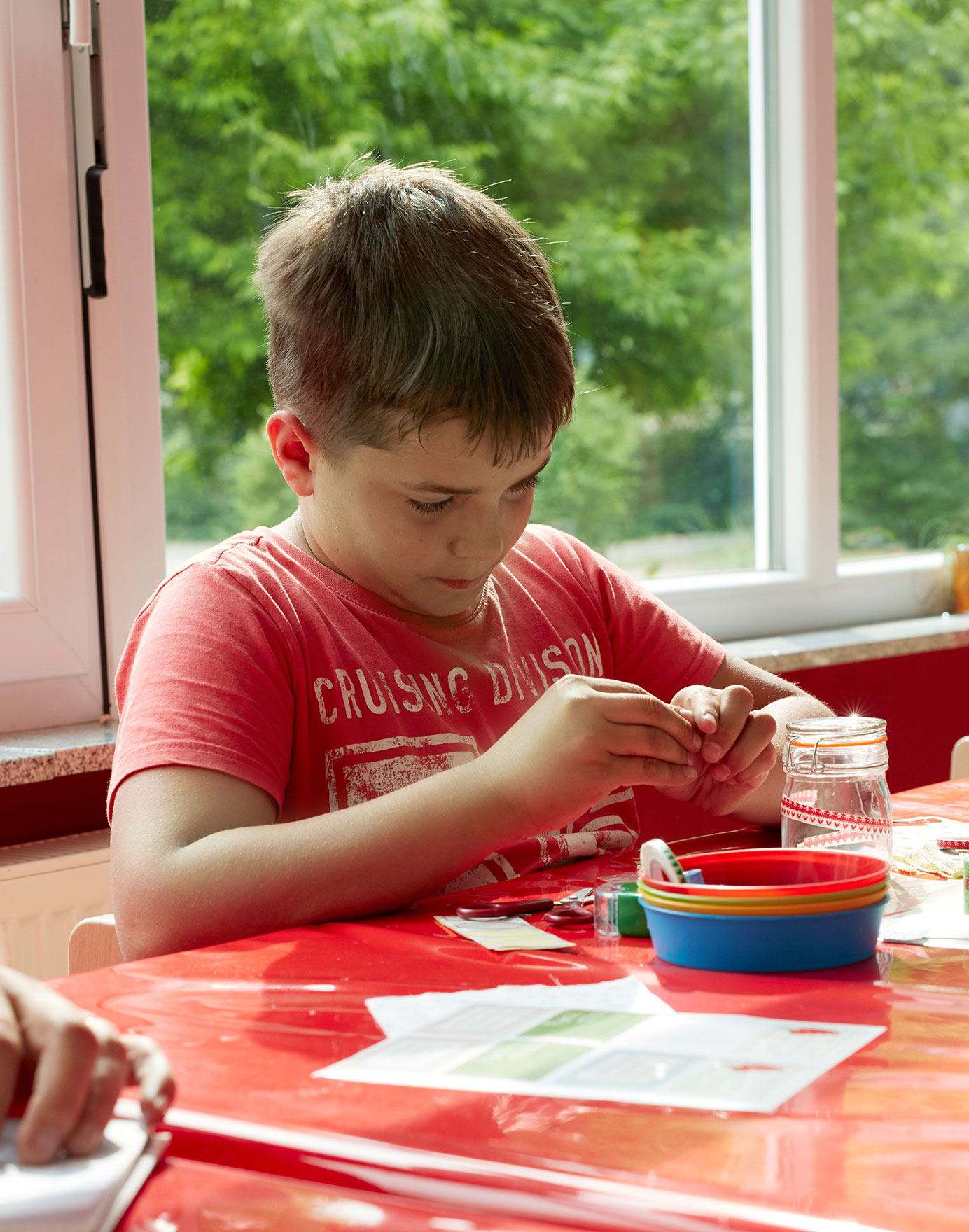 Felix comes to The Ark three times a week — to eat, play, and do crafts and homework (Photo)